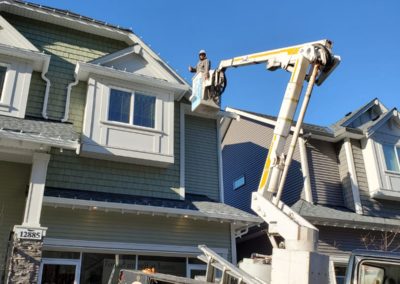 xmas light install at mill street showhome